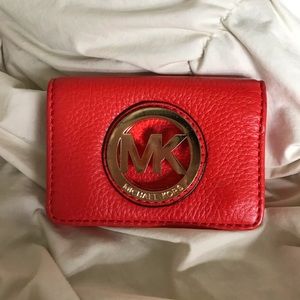 Orange Michael Kors card wallet